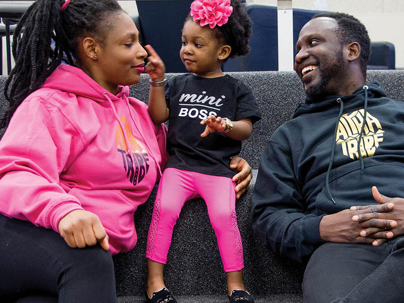 Image showing smiling parents with their toddler